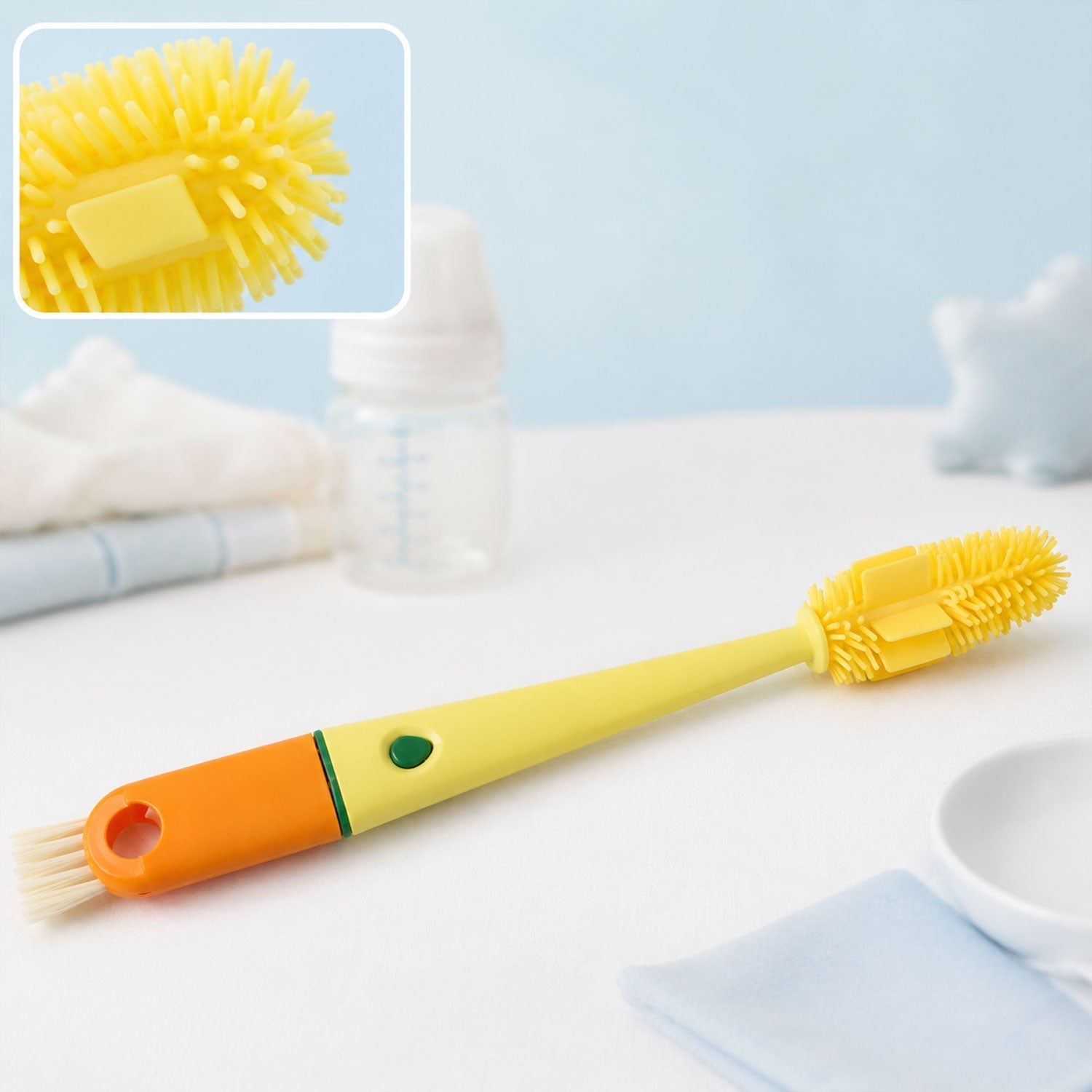 Silicone nipple brush built into bottle cleaning handle