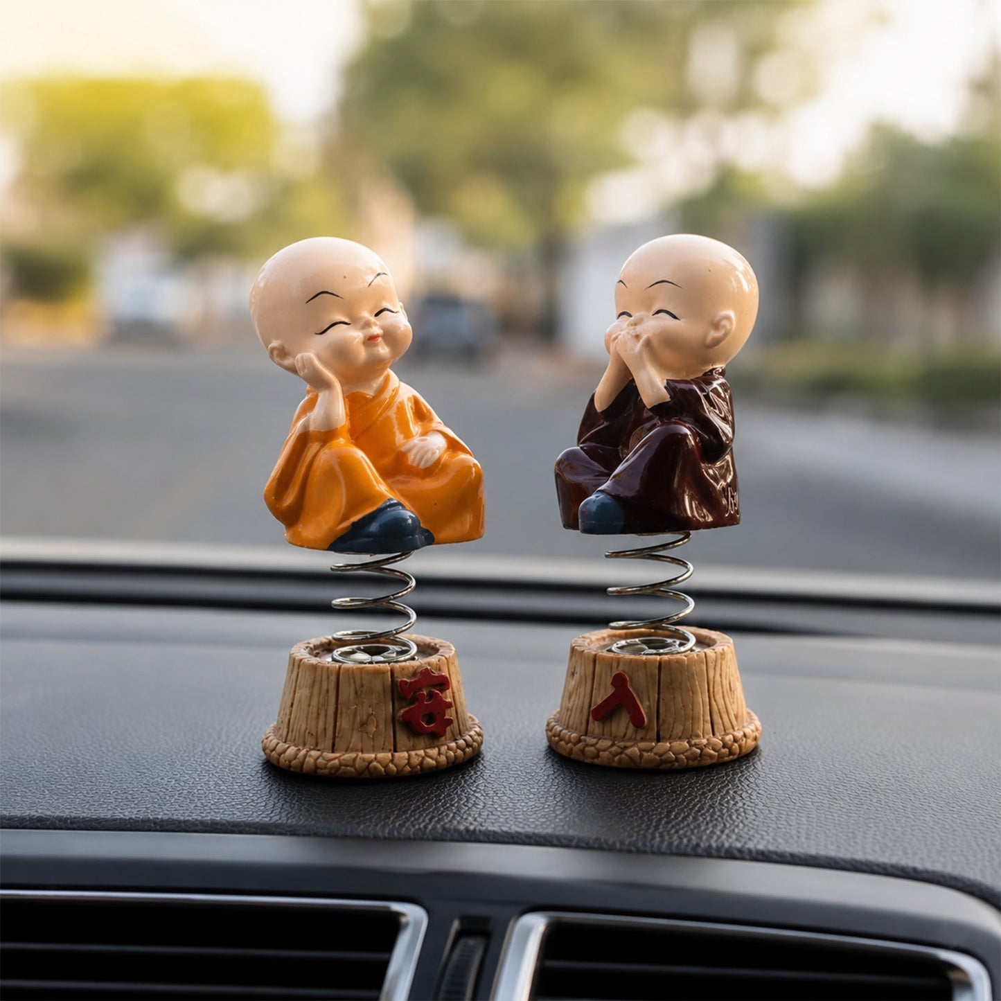 Close up of baby monk Buddha figurine expressions