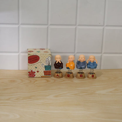Live photo of baby monk Buddha bobblehead set of 4