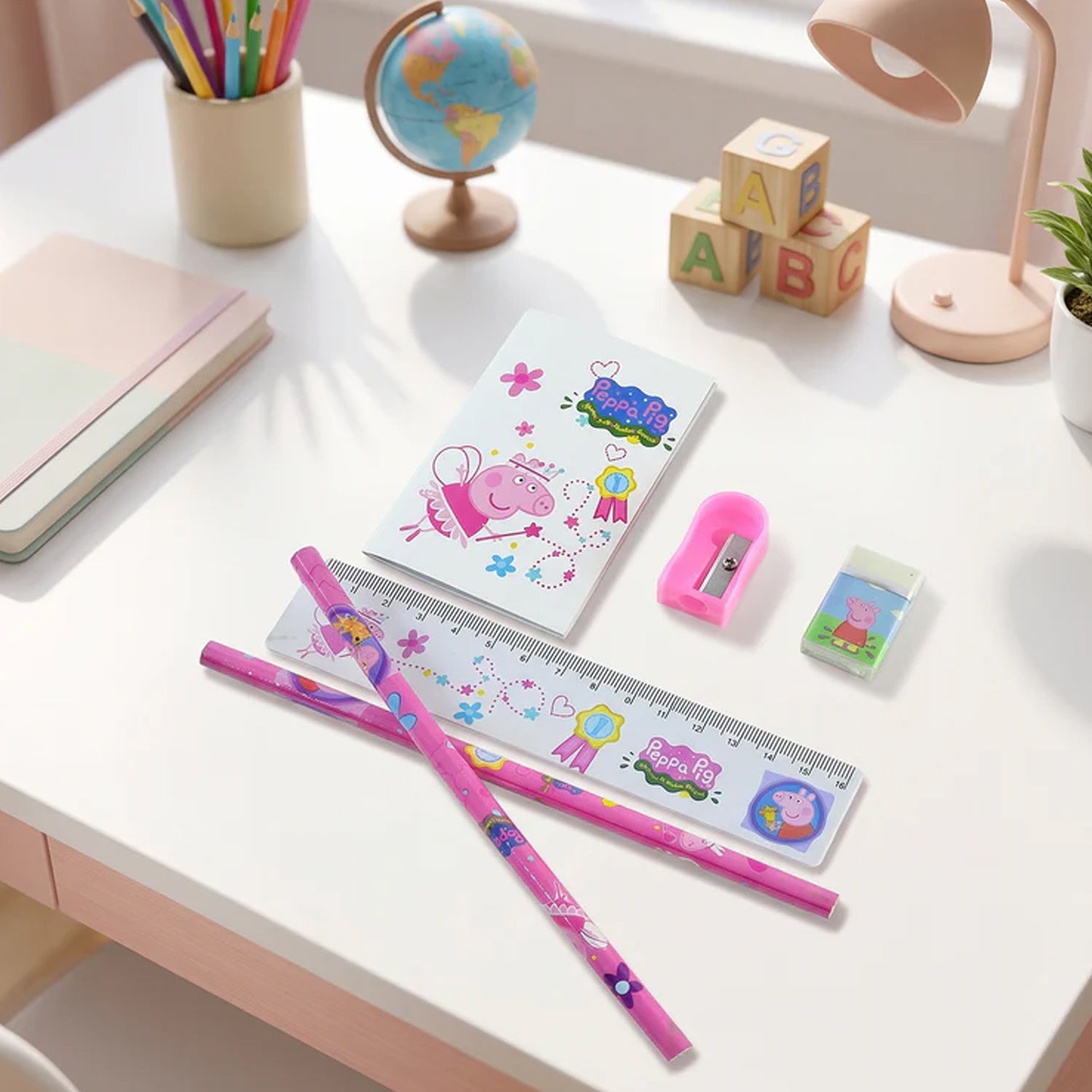 Stationery combo contents including eraser and sharpener