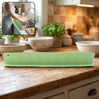 Main view of the flexible kitchen sink splash guard in green.