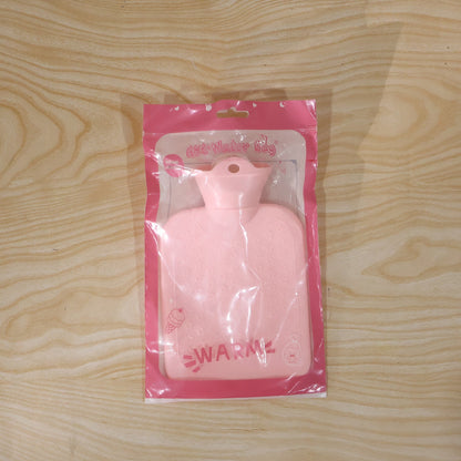 Live photo of reusable hot water therapy bag in plastic packing