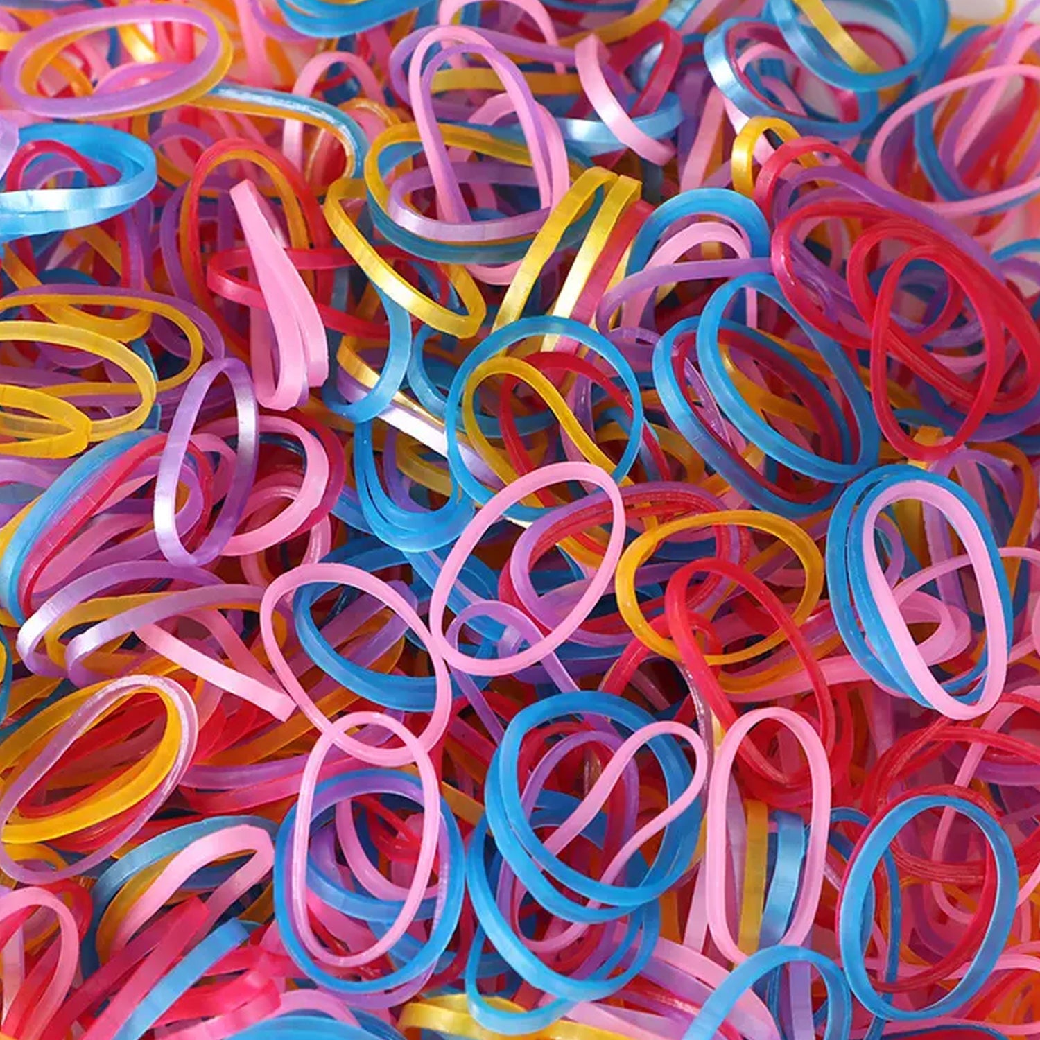A neatly stacked pile of colorful multicolor rubber bands on a clean white background.
