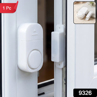 Wireless magnetic sensor alarm with adhesive mounting