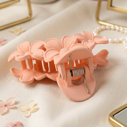 Close-up of large pink hair clip detail