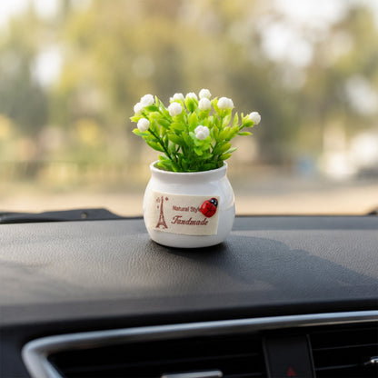 Faux flower plant in ceramic pot for living room and study