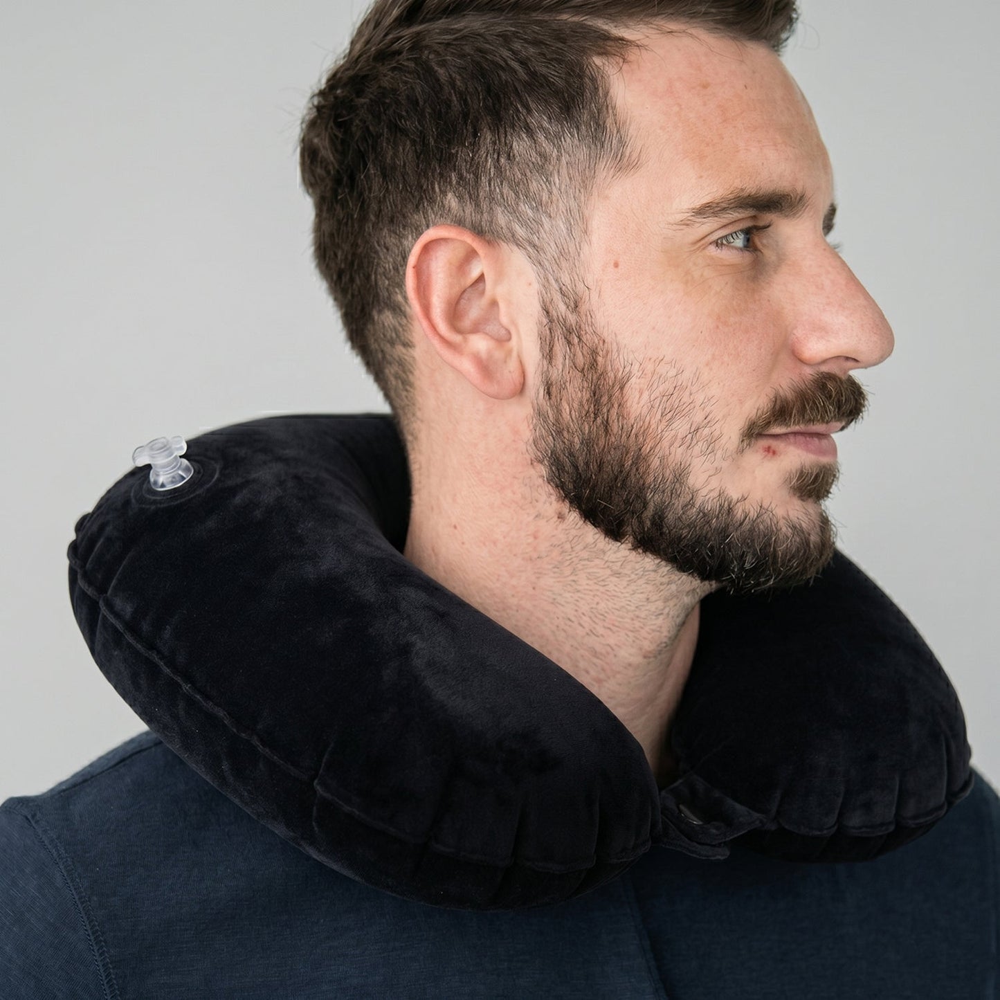Self inflating portable neck support