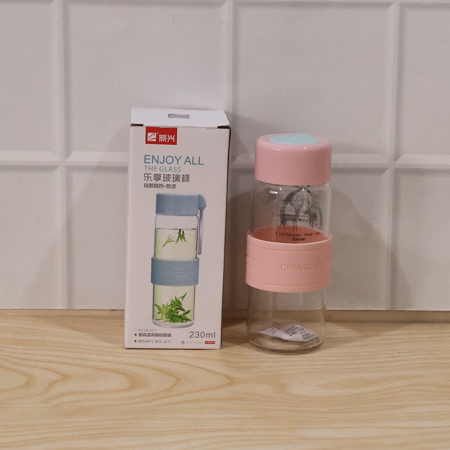 Mini 230ml glass water bottle with sleeve and strap for travel
