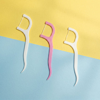 Dental floss picks white bg