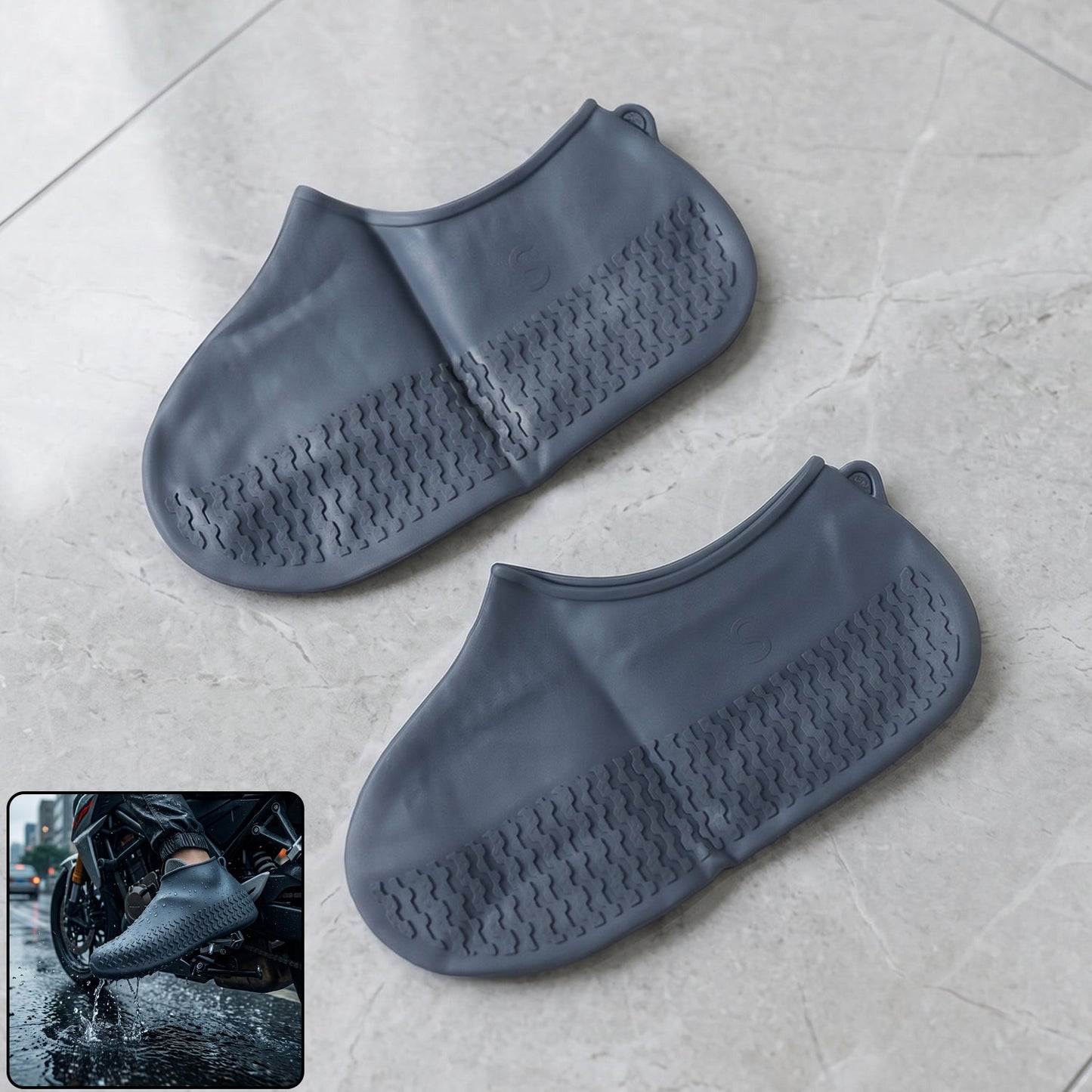 A pair of navy blue silicone shoe covers are displayed flat on a tiled floor, with an inset showing a person wearing one on