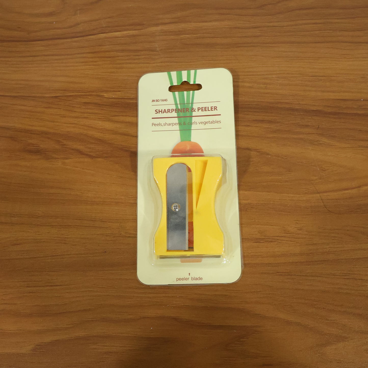 Vegetable sharpener & peeler tool in kitchen setting