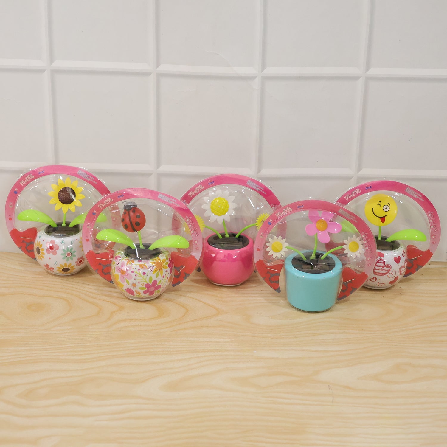 Fun solar powered flower pot toy that dances with light