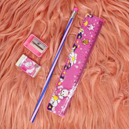 Complete pink kids stationery kit including ruler, pencil, eraser, and sharpener.