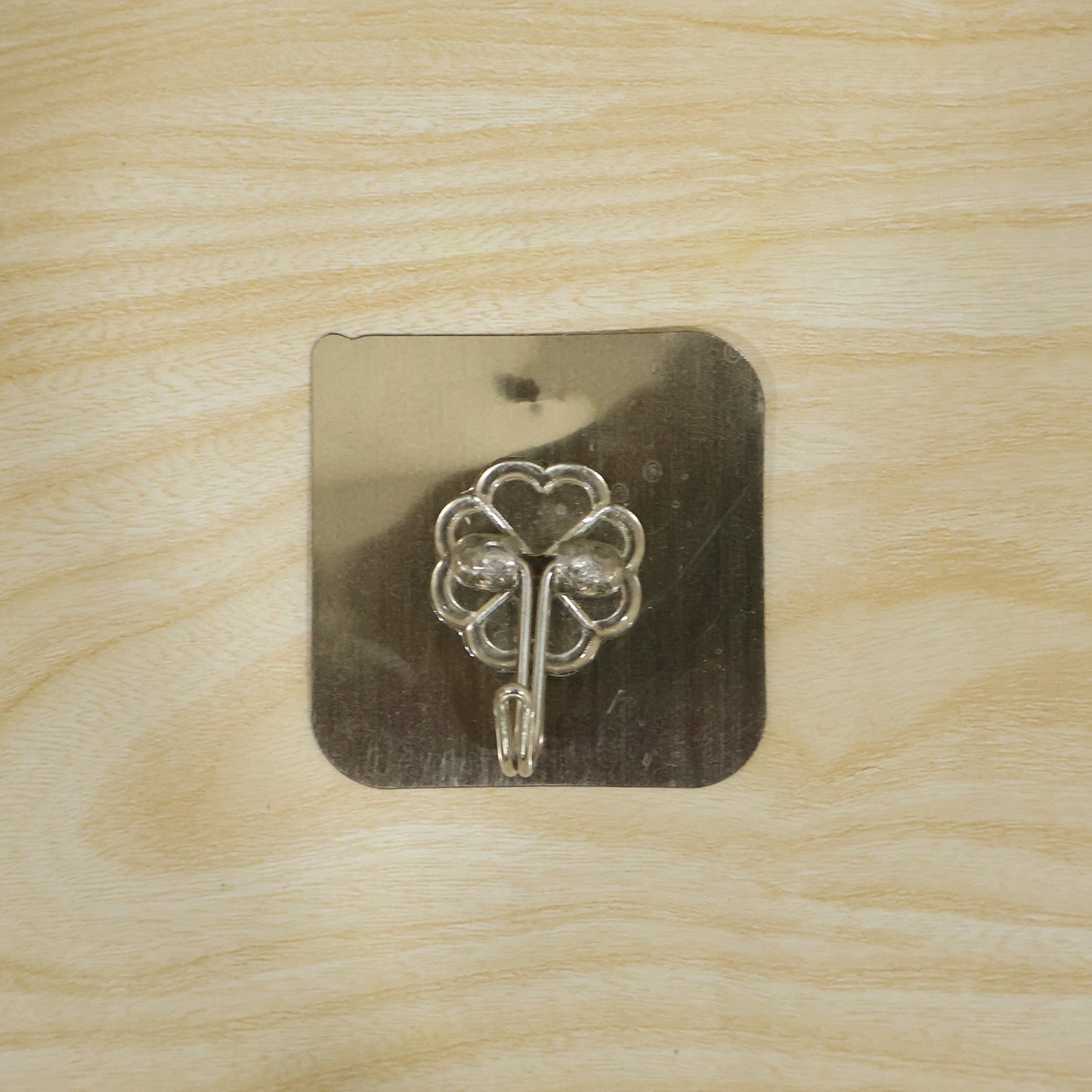 Reliable plastic wall hook with strong adhesive backing