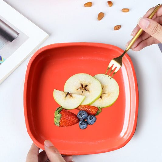 Durable food-grade plastic square quarter plates, a set of six.