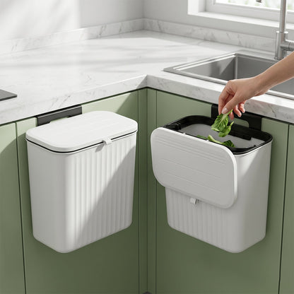 Kitchen dustbin on countertop with lid