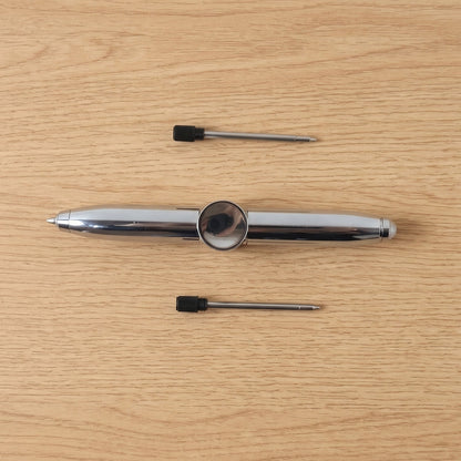 Compact multifunction spinner pen for stress relief and writing