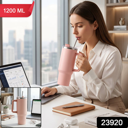Pink stainless steel tumbler with carry handle and straw